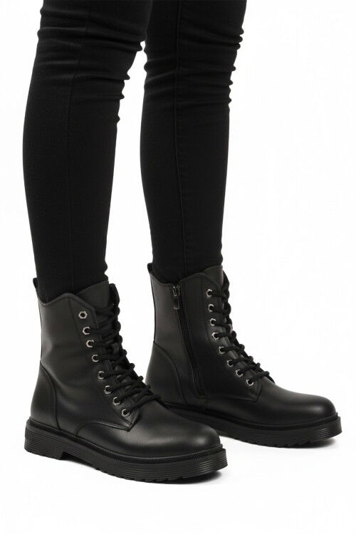 Siyah Cilt Kürklü Bağcıklı Fermuarlı Kaymaz Kadın Bot 525383 Z