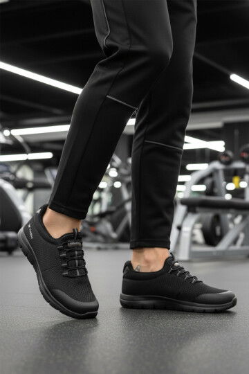حذاء رياضي رجالي خفيف الوزن محبوك باللون الأسود مرن II M